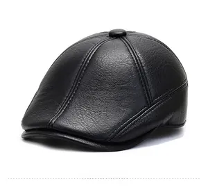 Close-up of black faux leather duckbill cap showing detailed stitching and fabric texture
