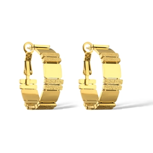 Luxurious gold geometric titanium hoop earrings with textured and polished finish
