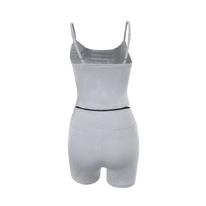 Rear view detail of grey knitted crop top and high waist slim shorts set for women