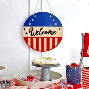 Patriotic July 4th Welcome wooden door sign with stars and American flag design