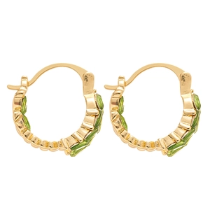 Elegant U-shaped gold hoop earrings with green marquise-cut gems in a wheat ear design