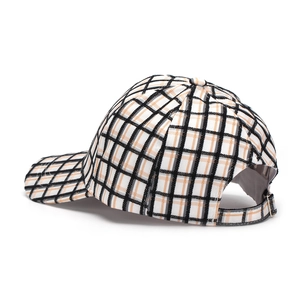 Detail of vintage plaid baseball cap showing the adjustable silver metal back buckle