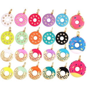 Macro view of 22 assorted micro-pave donut charms in vibrant enamel colors and 18K gold finish