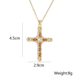 Detailed cross pendant dimensions showing 4.5cm height and 2.9cm width in gold