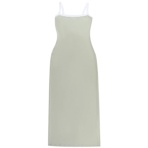 Detail of light green bodycon maxi dress with white contrast straps and slim fit design