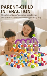 Children playing with colorful magnetic telescopic building blocks and connector balls