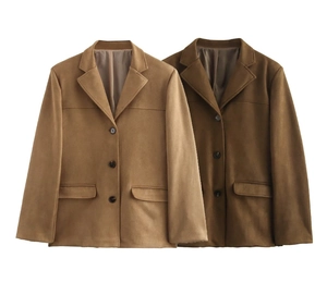 Flat lay of vintage suede jackets with lapel collars and flap pockets in khaki and brown