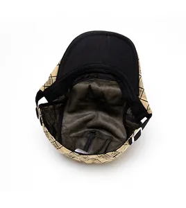 Detail view of cotton plaid newsboy cap with breathable lining and metal buckle