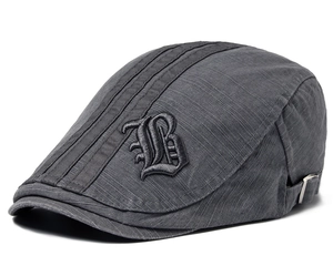 Detailed side view of dark grey cotton beret featuring gothic letter B embroidery
