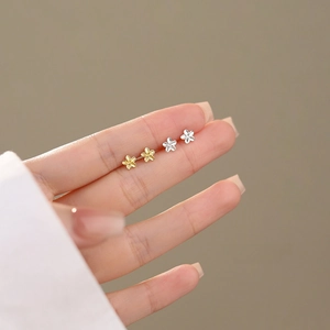 Minimalist S999 sterling silver flower stud earrings in gold and silver finish