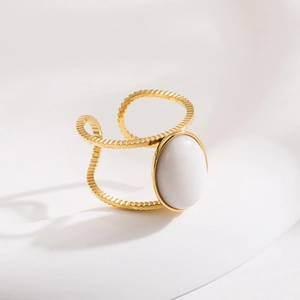 Vintage gold adjustable stainless steel ring with oval white stone and gear texture