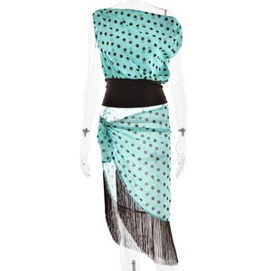 Turquoise one-shoulder two-piece set with black waist belt and fringe hem skirt