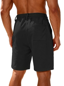 Rear view of black athletic shorts showing elastic waistband and back pocket details