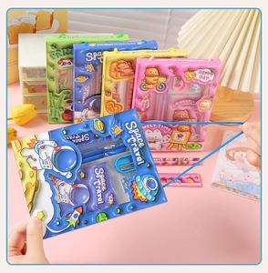 Close-up of portable cartoon stationery gift sets including pencils, ruler and sharpener