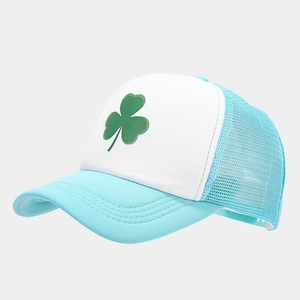 Detail of breathable mesh structure and clover print on the sky blue trucker cap