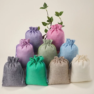 Linen drawstring jewelry pouches in nine assorted colors for gift packaging and storage