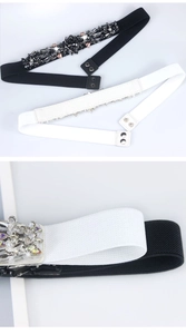 Detail of elegant elastic belts with sparkling rhinestone ornaments and snap button closure