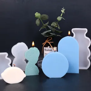 Close-up of geometric silicone candle molds with finished wax art for modern home decor