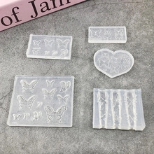 Detailed view of 5-piece silicone molds set with butterfly patterns for DIY nail art crafts
