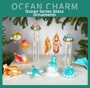 Detailed close-up of ocean-themed painted glass ornaments featuring a seahorse and mermaid