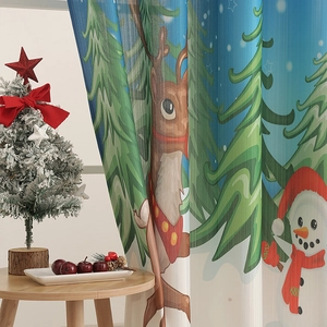 Detail view of blackout Christmas curtains featuring cartoon reindeer and snowman patterns
