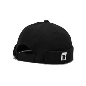 Classic black Docker hat with R letter patch and adjustable strap in a 45-degree side view