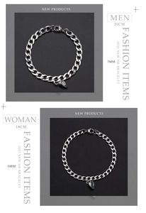 Detail of silver stainless steel Cuban link bracelets with magnetic heart charm