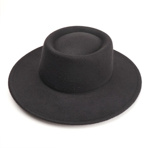 Detail view of the flat crown and wide brim on this classic black wool felt jazz hat