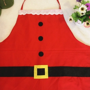 Festive red Santa Claus Christmas apron with black belt and white lace trim for holiday decor