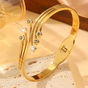 Elegant 18K gold-plated stainless steel triple-layered cuff bracelet with zircon accents
