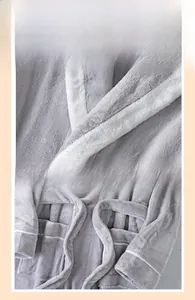 Detail of contrast collar and thick flannel texture on warm winter long bathrobe
