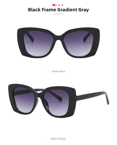 Detail of oversized black frame sunglasses with purple-to-gray gradient lenses