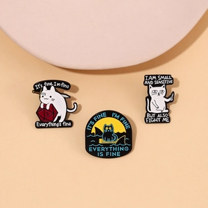 Detailed view of creative cat enamel pins with humor text and polished zinc alloy finish