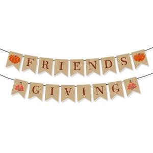 Detail of Friendsgiving burlap banner with pumpkin and turkey motifs for Thanksgiving decor
