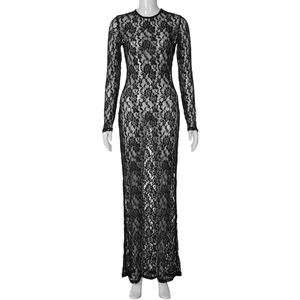 Close-up of black floral lace pattern and intricate mesh texture on long sleeve dress
