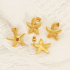 Golden starfish stud earrings set featuring smooth polished and textured surface finishes