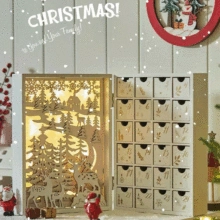 Macro detail of wooden Christmas advent calendar with 24 drawers and LED forest light scene