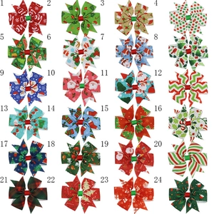 Set mit 24 Weihnachts-Haarschleifen für Mädchen mit festlichen Mustern wie dem Weihnachtsmann