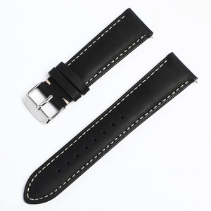 Detail view of black leather watch strap with contrast white stitching and silver buckle