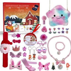 Christmas countdown gift set with colorful jewelry and toys arranged on white background