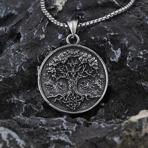 Macro shot of Viking Tree of Life relief pendant with vintage silver finish and box chain