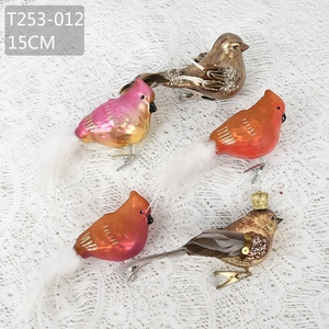 Detailed close-up of 15cm Christmas bird ornaments with sequins and feather accents