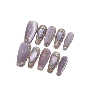 Purple cat eye press-on nails in long coffin shape with silver 3D metal and pearl decor