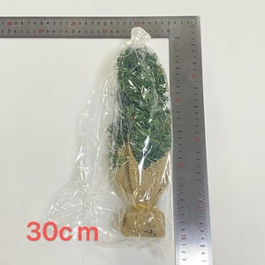Detailed view of a 30cm mini Christmas tree with burlap base and scale measurement