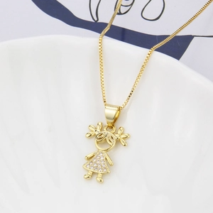 18k gold plated girl pendant necklace with sparkling cubic zirconia on a white plate