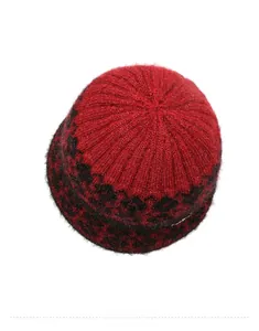 Top view of a red and black knitted wool bucket hat for elderly women with plush texture
