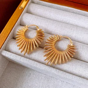Exquisite golden sunburst hoop earrings with textured radial metal bars for women
