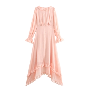 Detail view of pink chiffon dress with ruffled hemline and invisible back zipper on white background