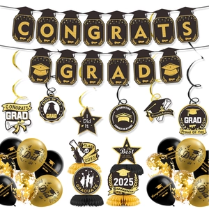 Close-up of 2025 graduation party kit with black gold banner and honeycomb decor