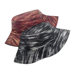 Retro hip-hop bucket hats with abstract metallic texture in reddish brown and dark grey